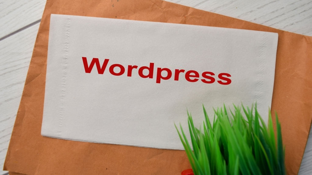 WordPress write on the tissue with wooden table background
